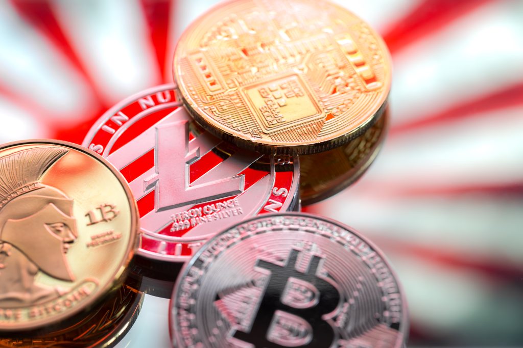 Coins Litecoin Bitcoin Against Backdrop Japan Japanese Flag Concept Virtual Money Close Up 1024x683